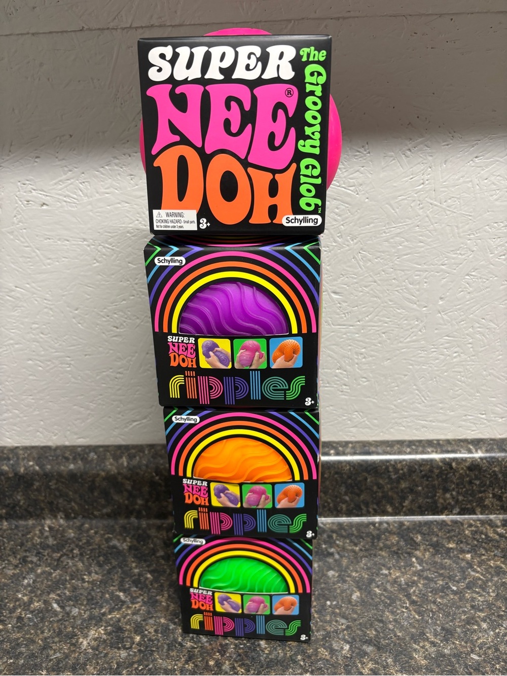 Super NeeDoh Groovy Glob and Ripple Lot. Pink, Purple, Orange, and Green
